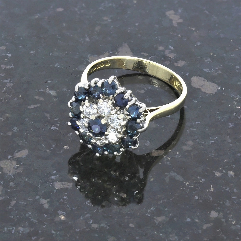Pre Owned 18ct Yellow Gold Sapphire And 0.25cts Diamond Cluster Ring
