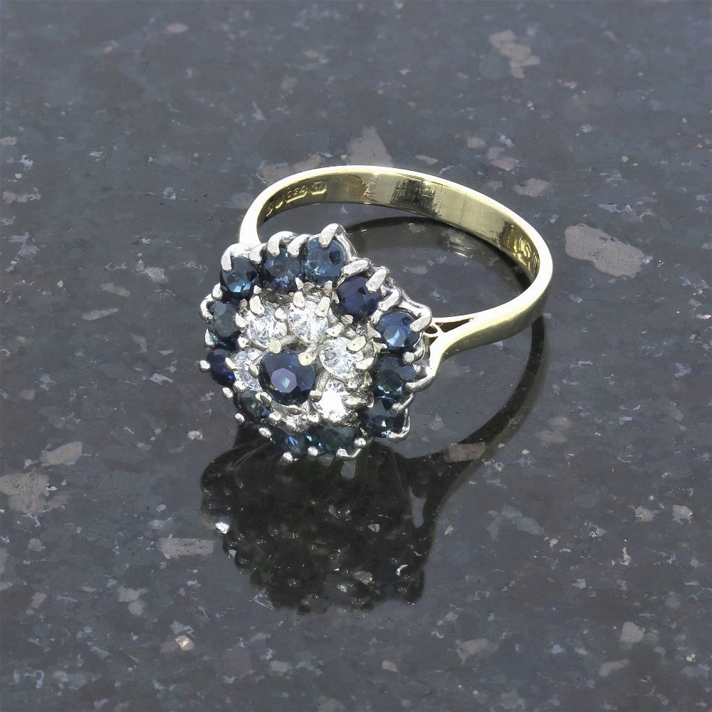 Pre Owned 18ct Yellow Gold Sapphire And 0.25cts Diamond Cluster Ring