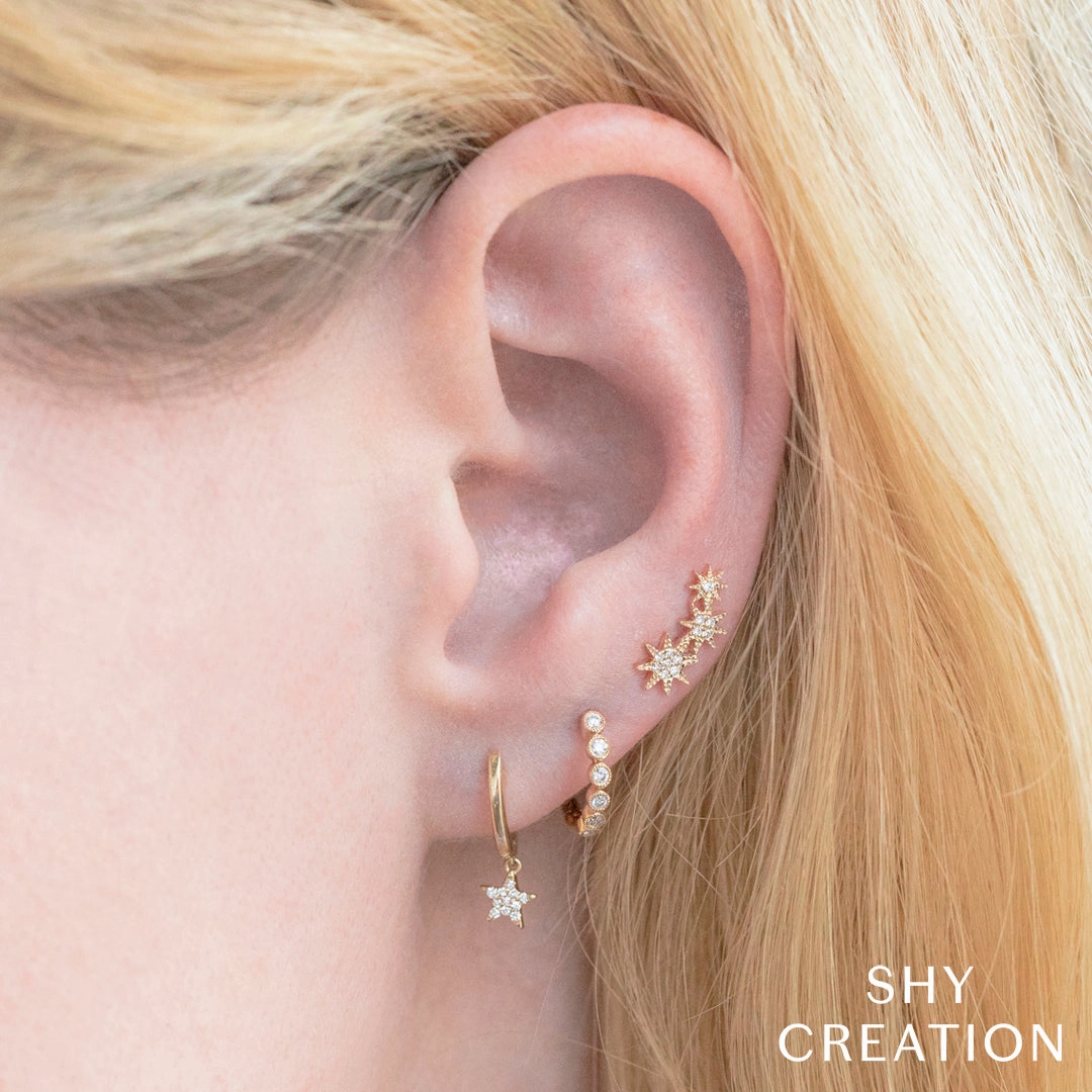 Shy Creation 0.04Ct Diamond Star Huggie Earring SC22004812V2