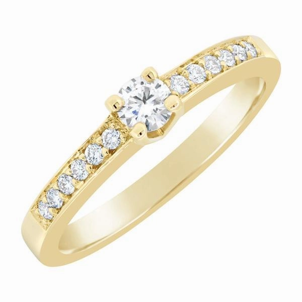 Solitaire en or jaune serti de diamants.